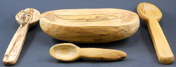 Carved spoons and a bowl